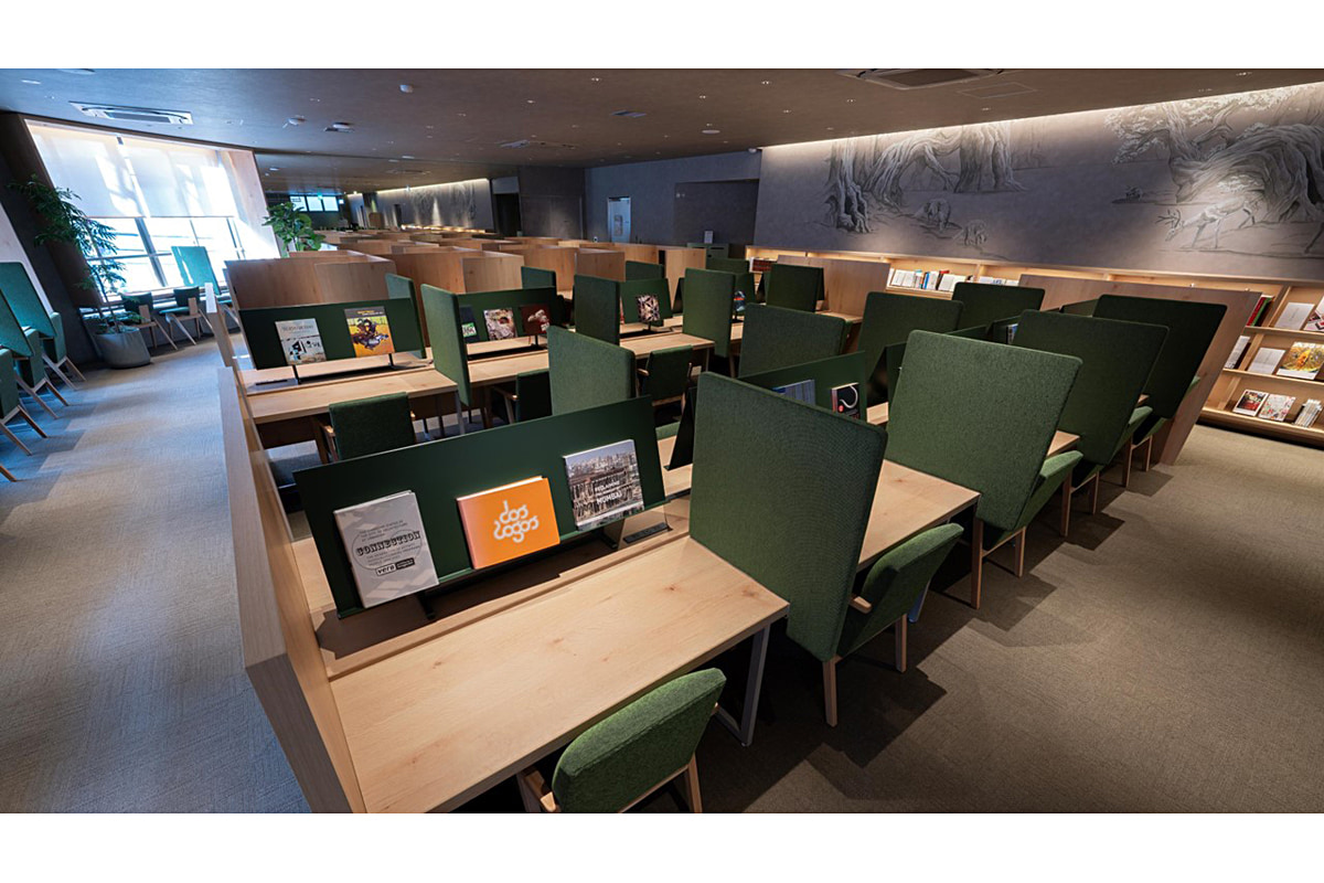 木に深い緑のアクセントをきかせたワークスペース